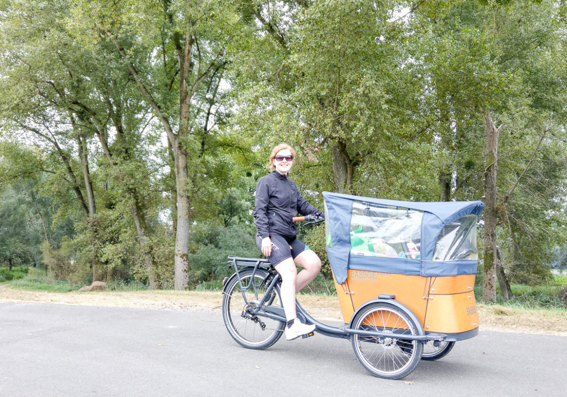 Babboe Curve-E Lastenfahrrad Erfahrung Fahrrad fahren am Rhein mit Baby mehrere Tage Fahrradurlaub
